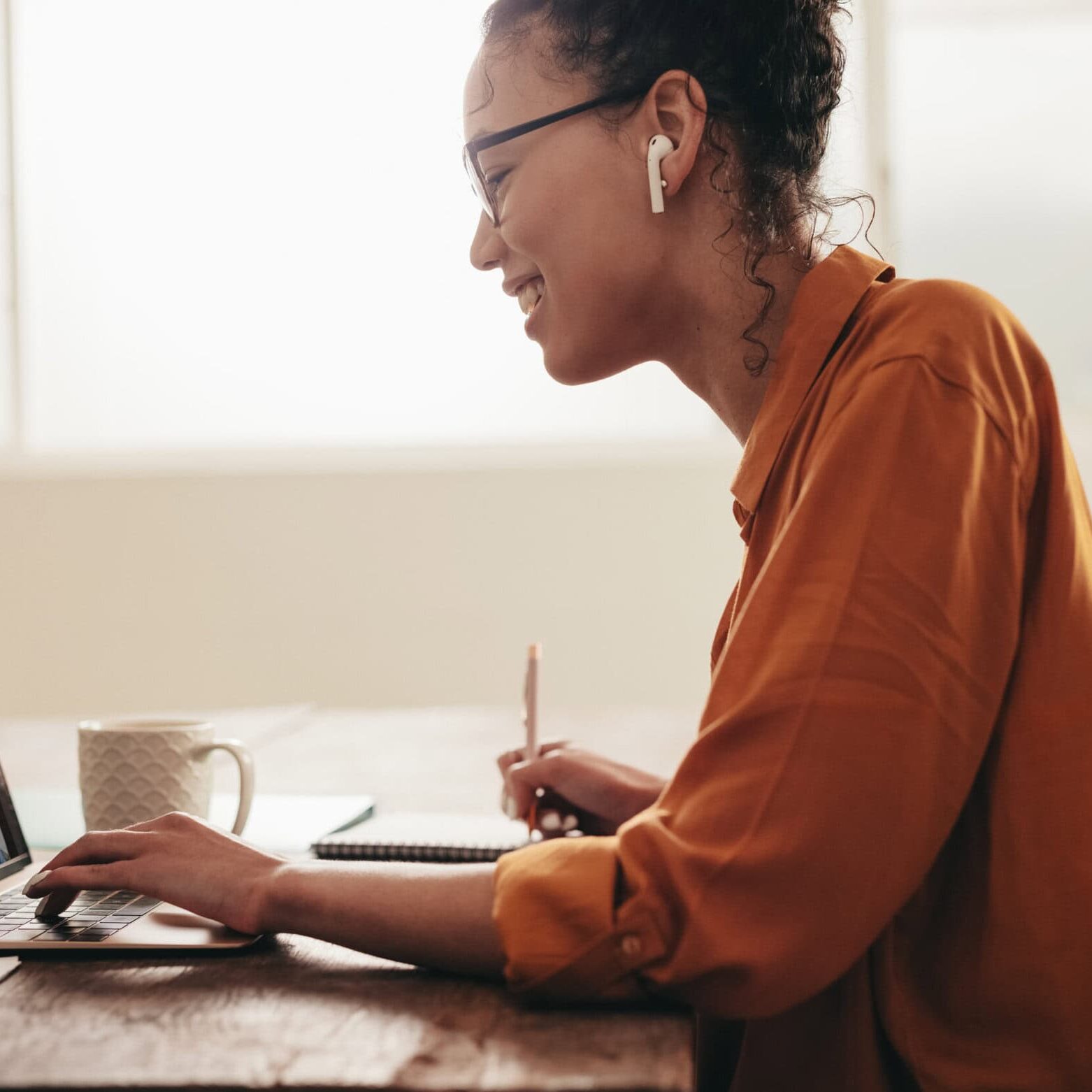 Business woman on a video conference call with colleagues Coach educators aligning their program with ICF accreditation standards.