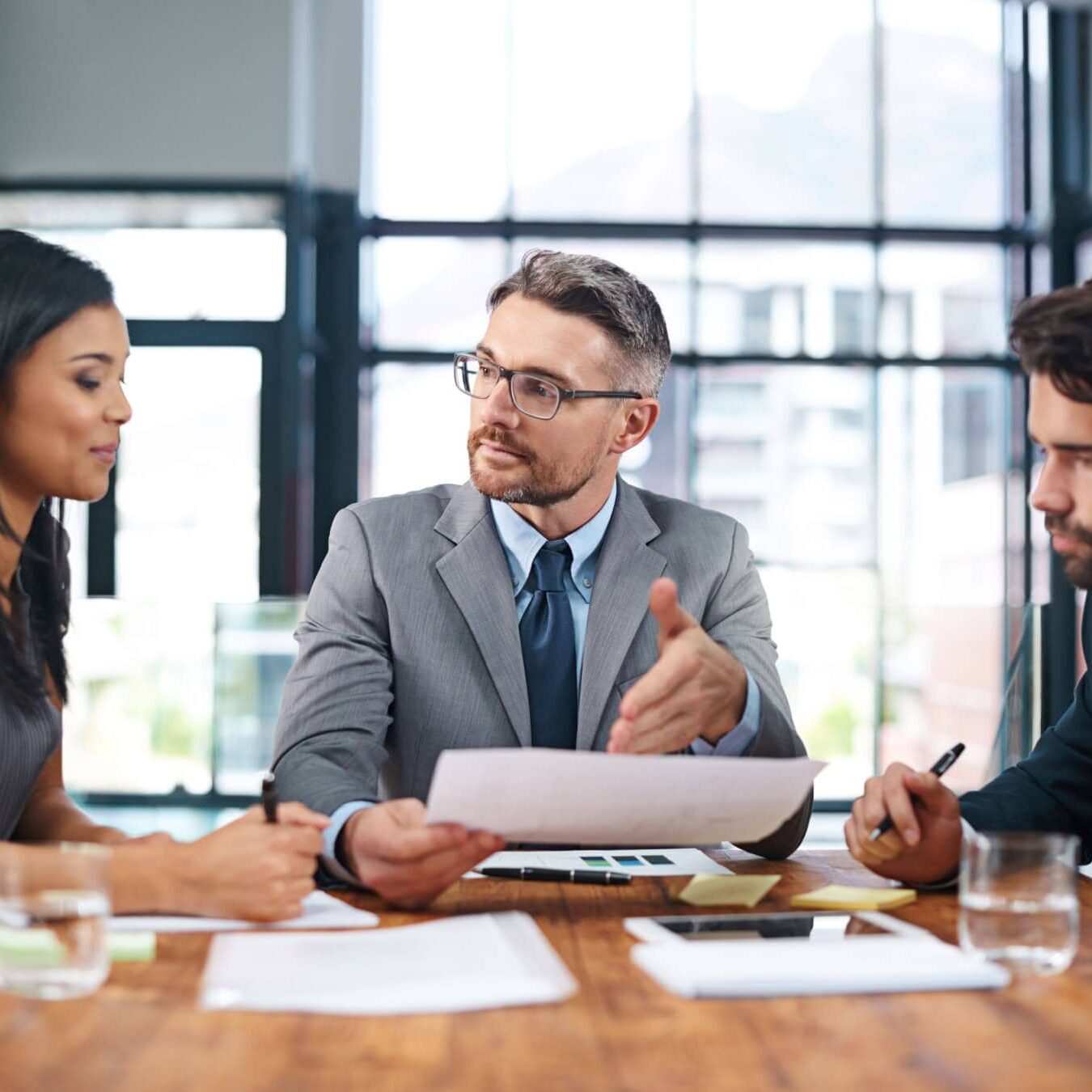 icf-credential-actc-exam-structure A group of professionals go through the ACTC structure in an office setting
