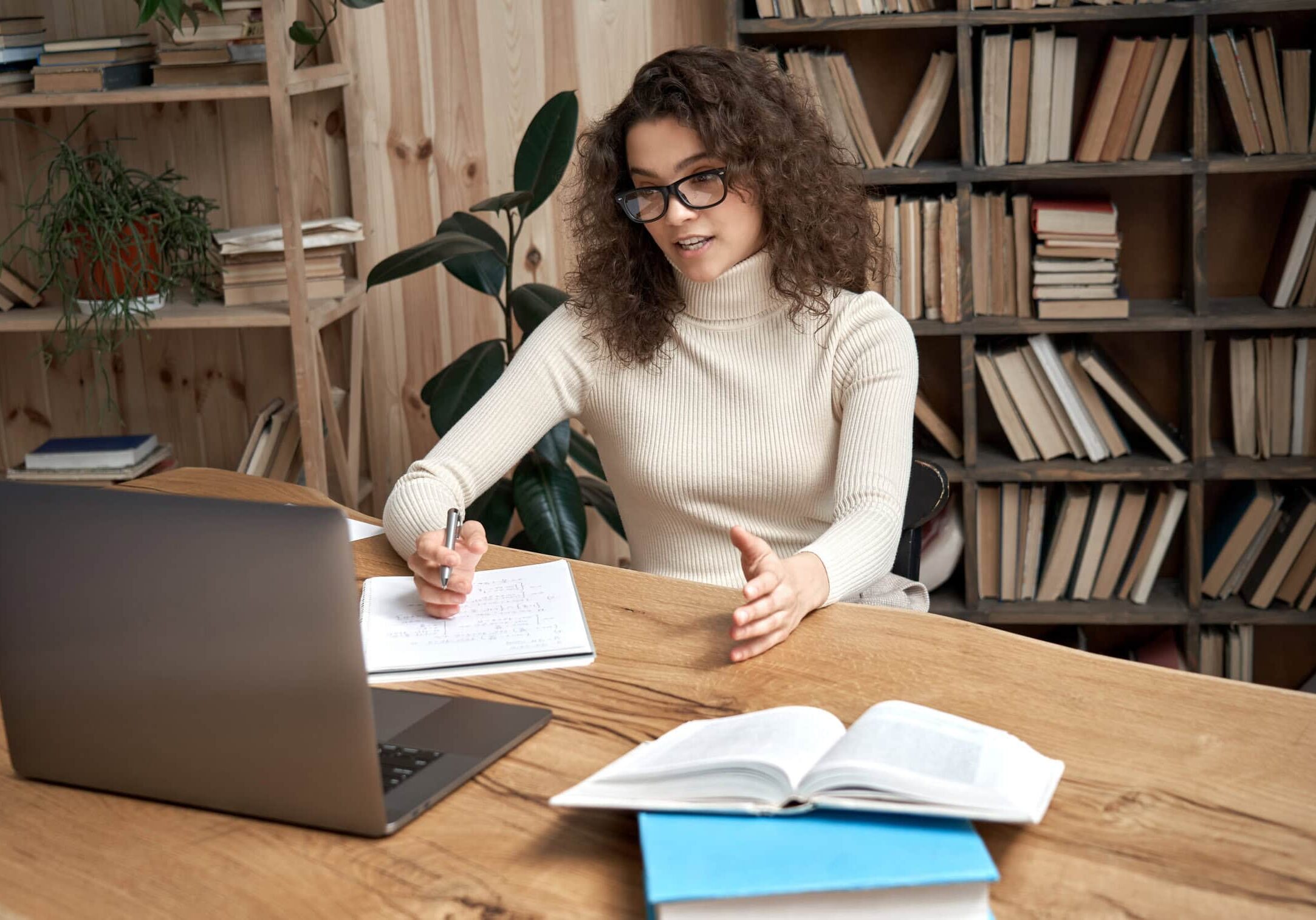 Virtual,Teaching,Concept.,Female,Young,Hispanic,School,Math,Teacher,,College Coach investing in their professional future through education and training.