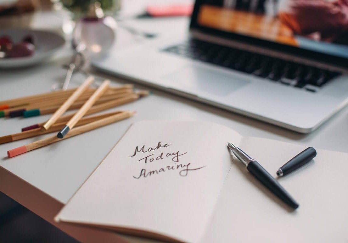 icf-get-coaching-personal-success Notepad with make today amazing written on it, with a pen. Inspiration for achieving personal success