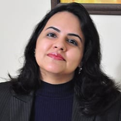 Headshot of Shweta Handa-Gupta, MCC with the International Coaching Federation. Known for coaching top CEOs and driving global impact on peace, climate, and education.